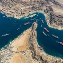 Iran charges Hormuz fees by...?